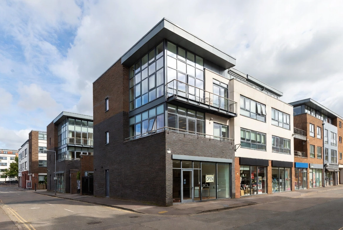 Triple glazed shop front windows on a UK high street.